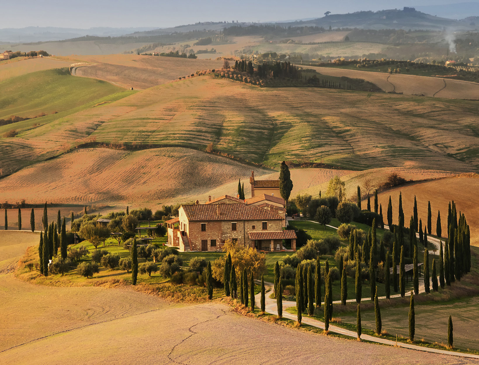 Rolling Val d’Orcia hills around a countryside estate